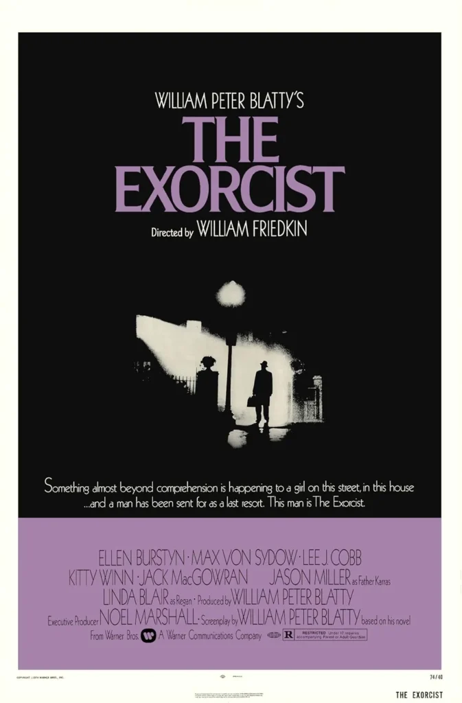 Classic movie poster for The Exorcist (1973), featuring a silhouetted figure of the priest standing under a streetlamp, gazing at a house shrouded in mist. The film title appears in bold purple letters against a black background.