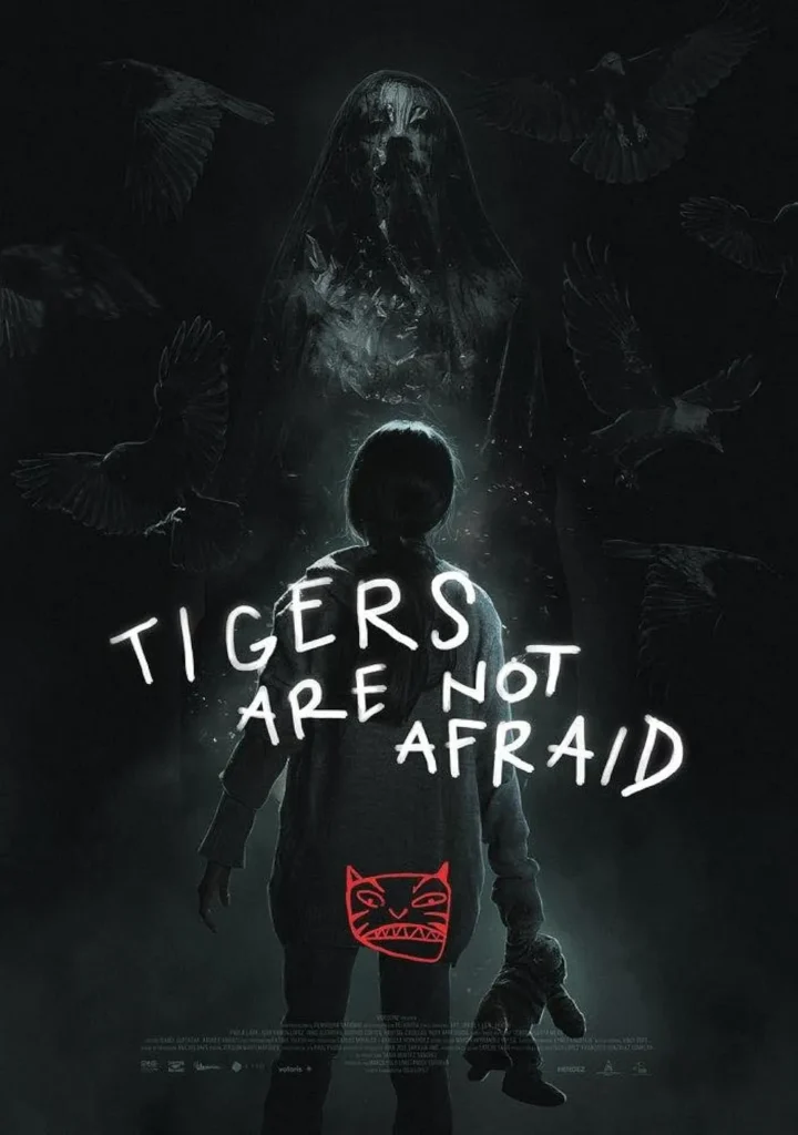 Movie poster for Tigers Are Not Afraid, featuring a young girl holding a stuffed toy, facing a ghostly figure shrouded in darkness with crows circling ominously. The title appears in eerie handwritten text, enhancing the film’s haunting atmosphere.