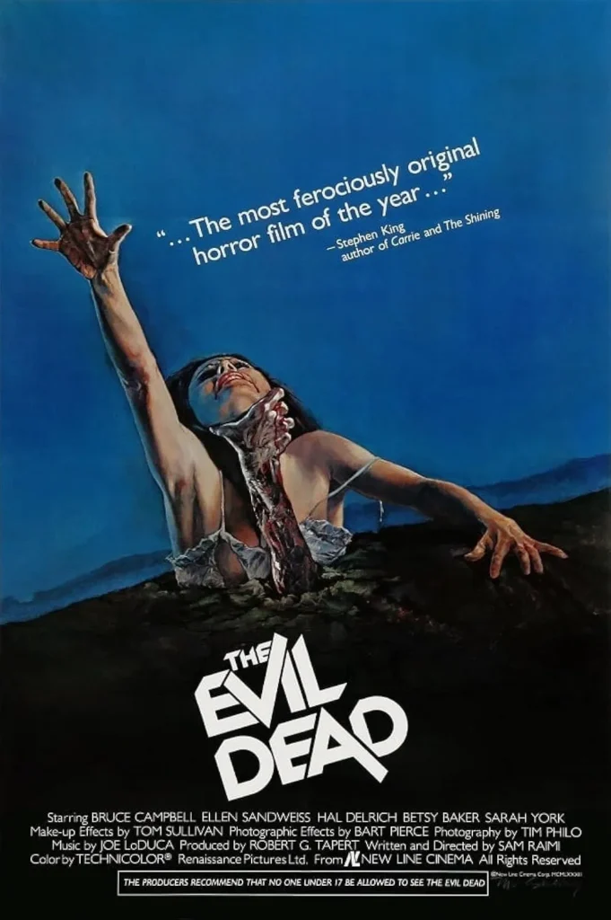 The Evil Dead movie poster featuring a woman in a white nightgown being dragged into the ground by an unseen force, her face twisted in terror as she reaches out with one desperate hand. The eerie blue background contrasts with the horror of the moment, while Stephen King's quote above calls it 'the most ferociously original horror film of the year.