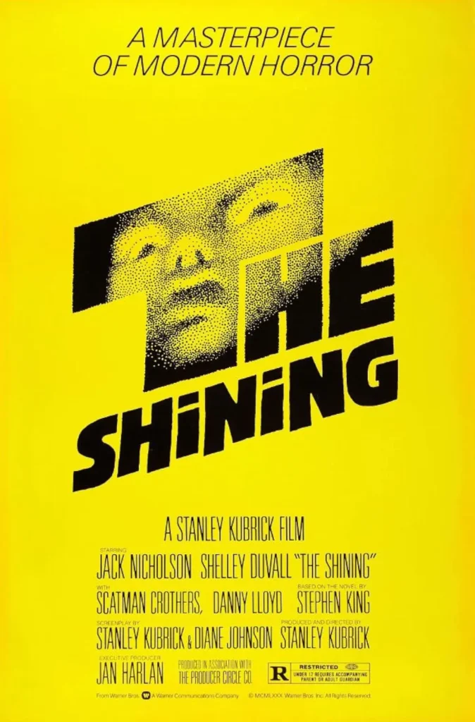 The Shining movie poster featuring a striking yellow background with the film's title in bold, black, blocky letters. A halftone image of a distressed face is embedded within the typography, creating an eerie effect. The tagline at the top reads, 'A masterpiece of modern horror,' emphasizing the film's iconic status. Directed by Stanley Kubrick and starring Jack Nicholson and Shelley Duvall.